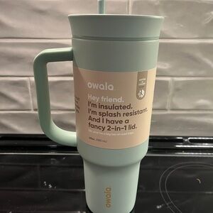 Owala Insulated 40 Ounce Mint Colored Tumbler With Lid And Straw